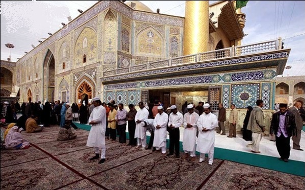 Sunni Muslims Praying at the Holy Shrine of Hazrat Ali a.s in Najaf , Iraq