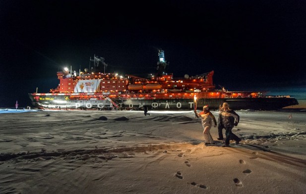 Winter Olympics torch @ the North Pole in the Frozen Sea