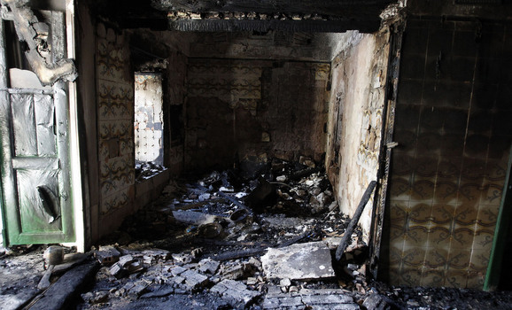 Damage is seen at the burnt out Saida Manoubia shrine in the governorate of Manouba, west of the capital, in Tunis
