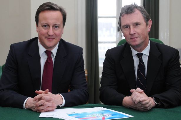 British PM David Cameron with MP Nigel Evans