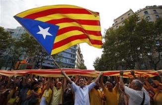 Catalan separatists form a human chain to mark Catalunya's National Day in central Barcelona
