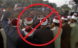 Clerics supporting deposed Egyptian President Mohamed Mursi attend a rally at the Raba El-Adwyia square where Mursi's supporters are camping in Cairo