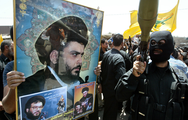 Iraq's Shiite Malatias Vows to attack US Interests