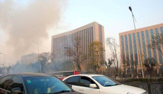 Blasts hit provincial HQ of China communist party; 1 killed, 8 injured