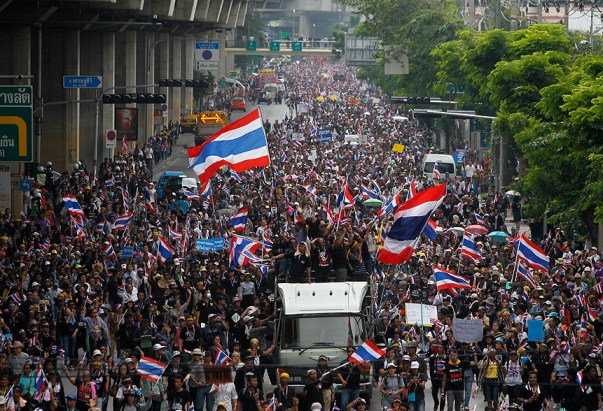 Anti-government protesters march toward Thailand's Finance Ministry in Bangkok