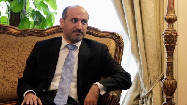 President of the Syrian National Coalition Ahmad Al-Jarba looks on during his meeting with Egypt's Foreign Minister Nabil Fahmy  in Cairo