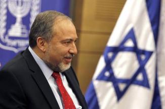 Lieberman, head of the far-right Yisrael Beitenu party, attends a Likud-Beitenu faction meeting at the Knesset in Jerusalem