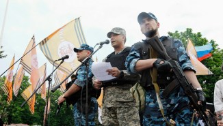 Self-styled governor of Luhansk region Bolotov delivers speech during rally to mark and celebrate announcement of results of referendum on status of Luhansk region in Luhansk