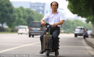 Suitcase MotorBike with its Owner a