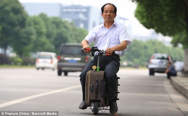 Suitcase MotorBike with its Owner a