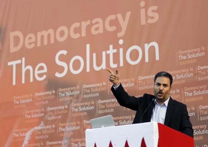 Khalil al-Marzouq of Al Wefaq speaks during an anti-government rally organized by his party in the village of Saar