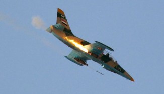 Syria pounds ISIL positions in coordination with Iraq