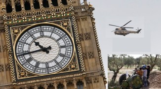 A French Puma Support helicopter from the French Army Air Corps flies past the Big Ben clock tower as it participates in a training exercise in London
