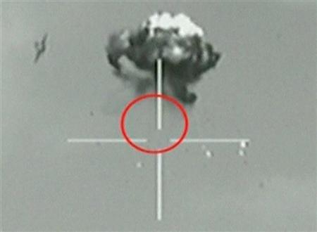 A still image taken from IDF video footage shows what they say is a small unidentified aircraft shot down in a mid-air interception after it crossed into southern Israel