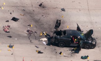 The car that was used the previous night by two gunmen is investigated by local police and the FBI in Garland