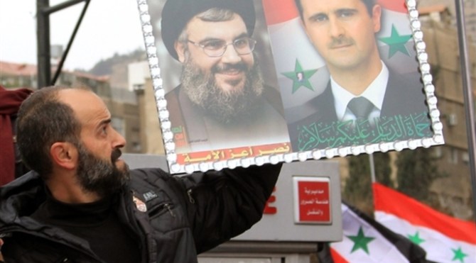 Syrian forces with Hezbollah fighters March to Re Captue Al Zobdani