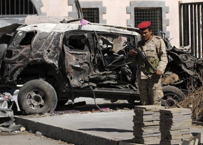 Survivors visit the site of bombing at Yemen's Defense Ministry