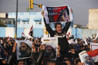 Supporters of Shi'ite cleric Moqtada al-Sadr protest against the execution of Shi'ite Muslim cleric Nimr al-Nimr in Saudi Arabia, during a demonstration in Baghdad
